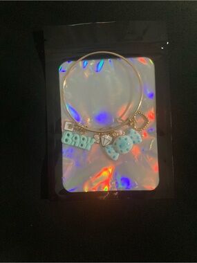 Gold Tone Baby Blue Charm Bracelet with Polka Dot Bow